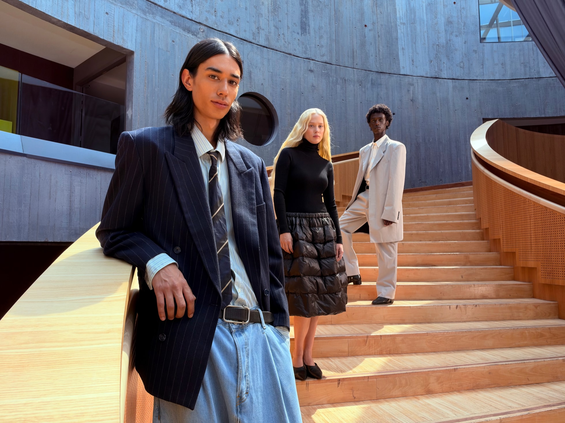 People on a staircase with crisp background detail, shot on iPhone 18 Pro