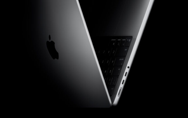 MacBook Pro positioned into the shape of a V, referencing the M5 chip