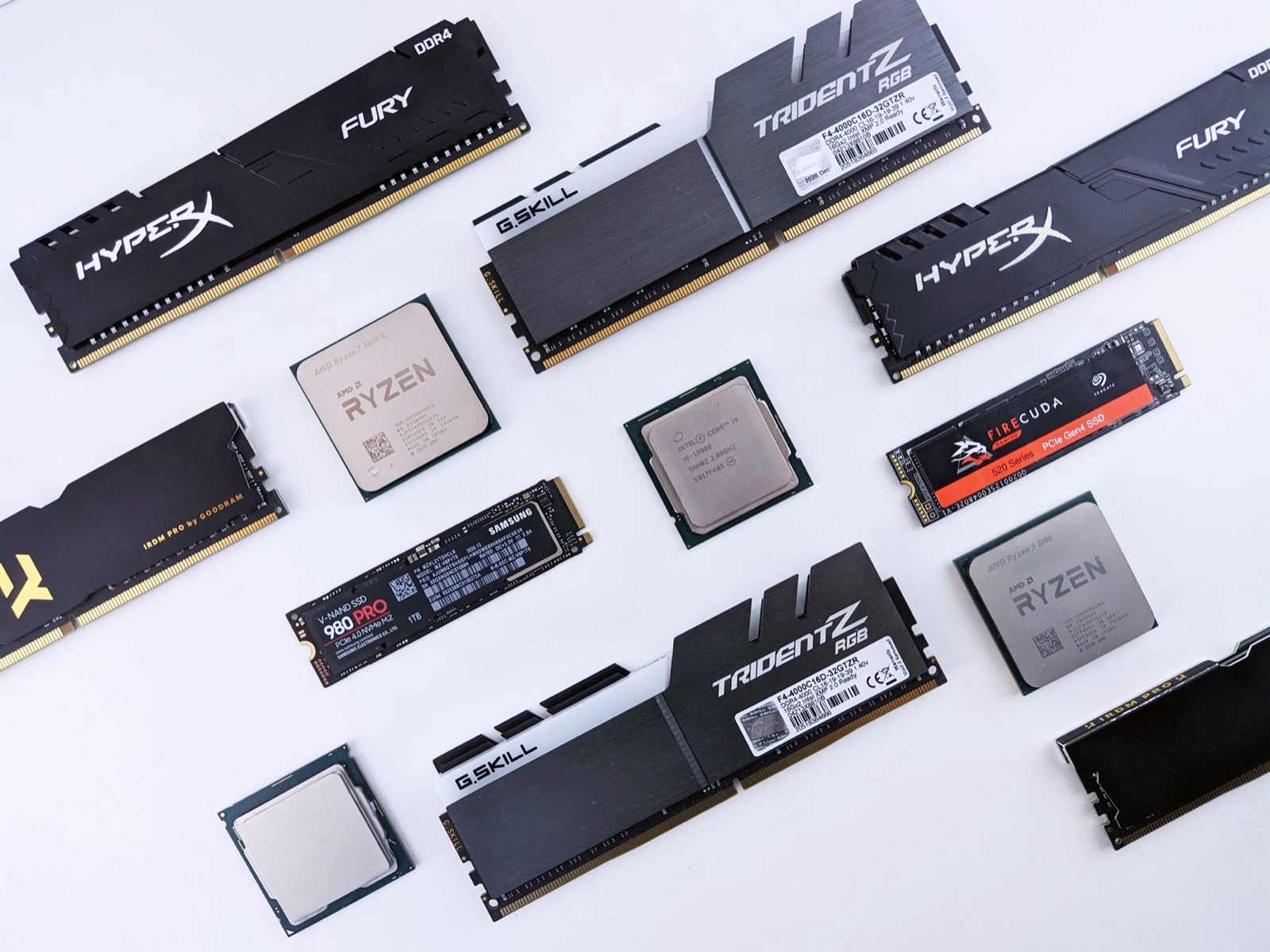 AMD Ryzen processors and RAM modules laid out on a table