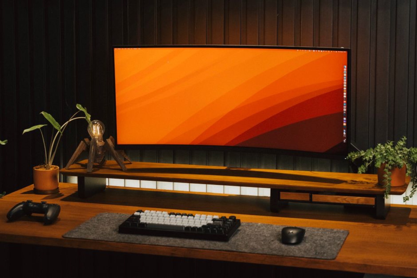 A curved monitor on a desk
