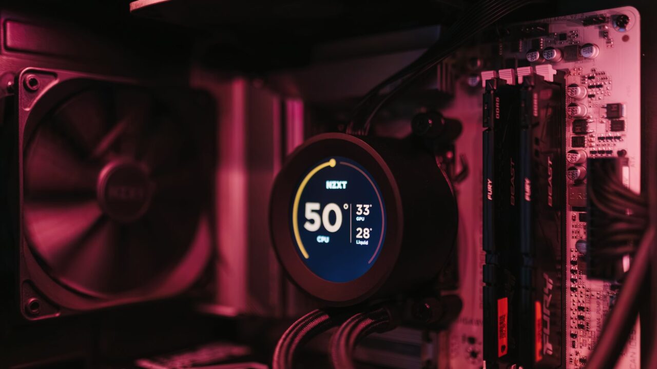 Liquid cooler display showing a CPU temperature of 50 degrees inside a gaming PC