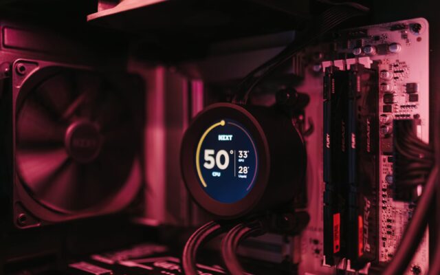 Liquid cooler display showing a CPU temperature of 50 degrees inside a gaming PC