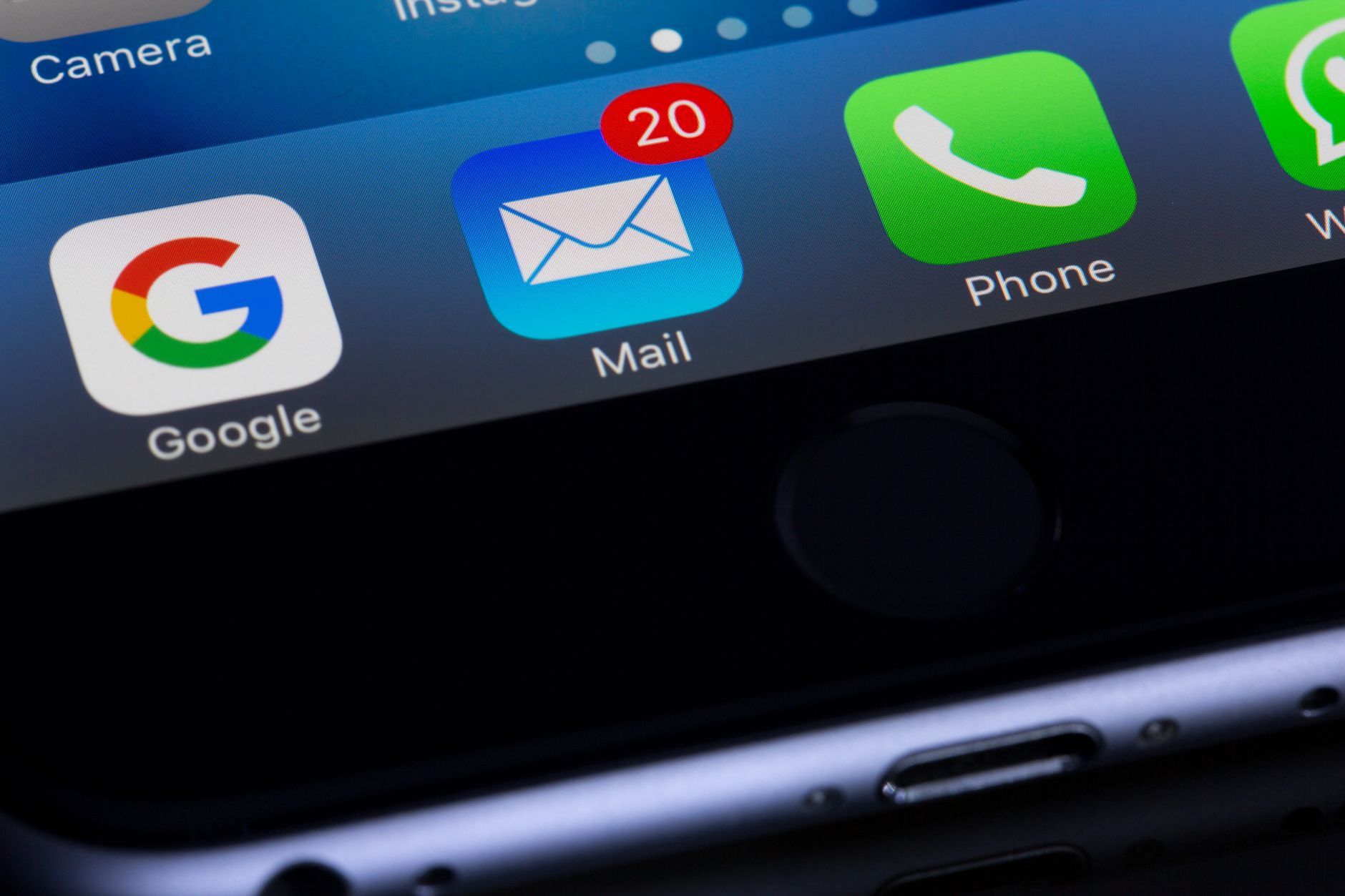 Google and Mail app icons on a smartphone