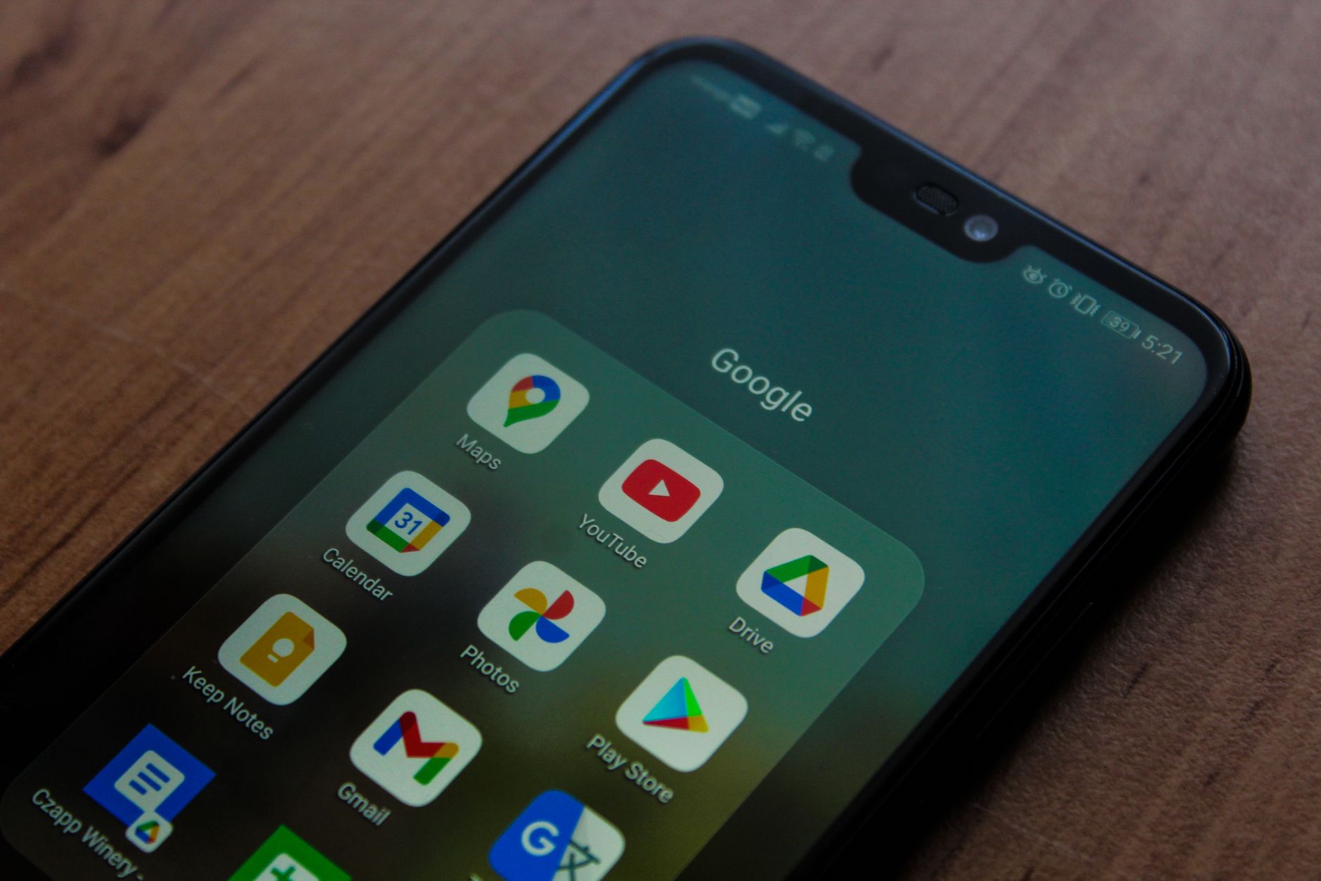 A smartphone home screen full of Google apps