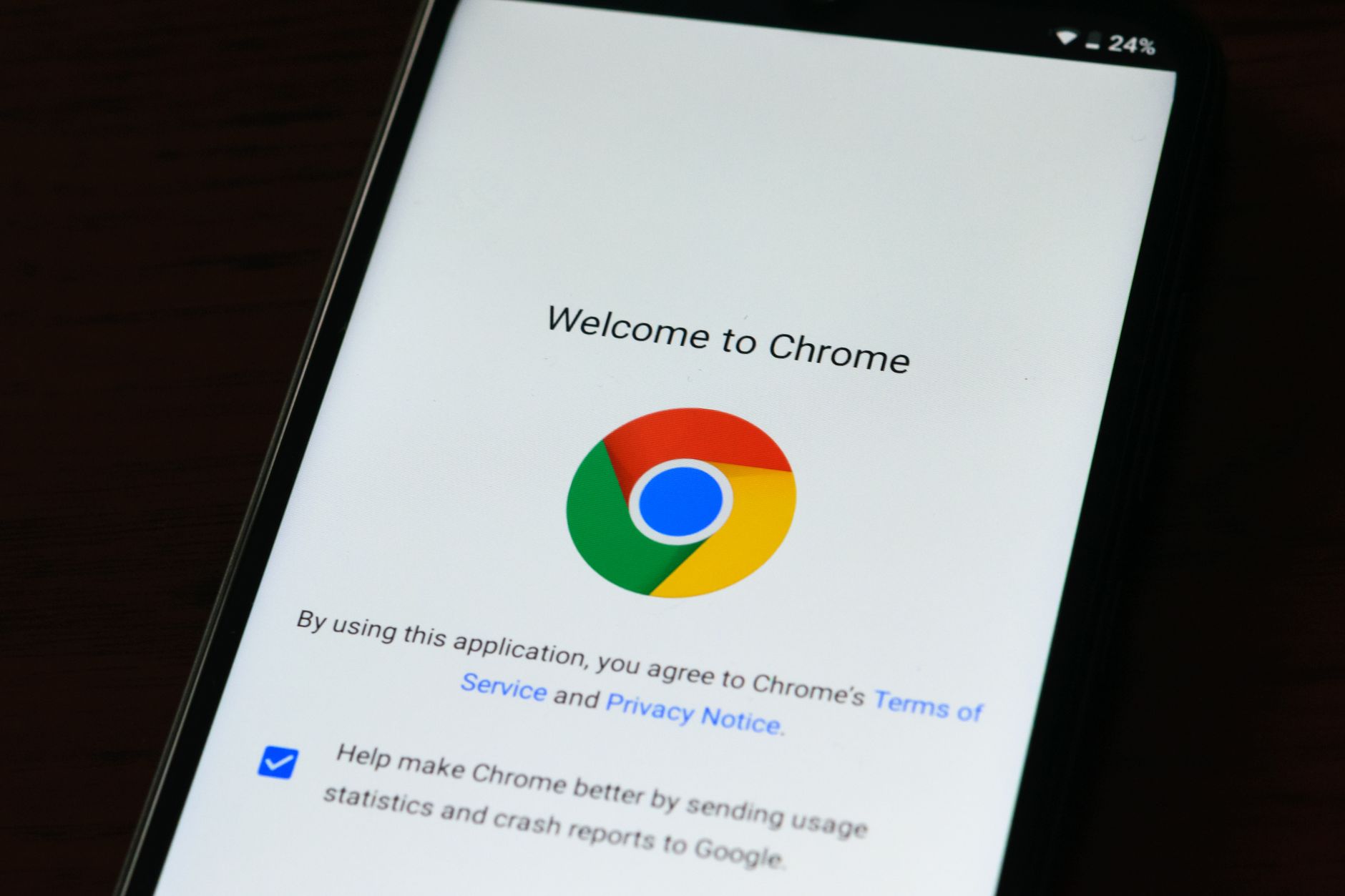 A phone showing Google Chrome's welcome screen