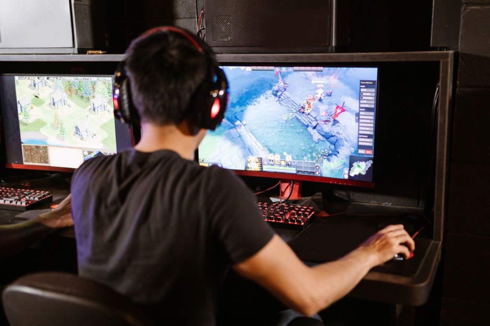 A man playing a game on a PC