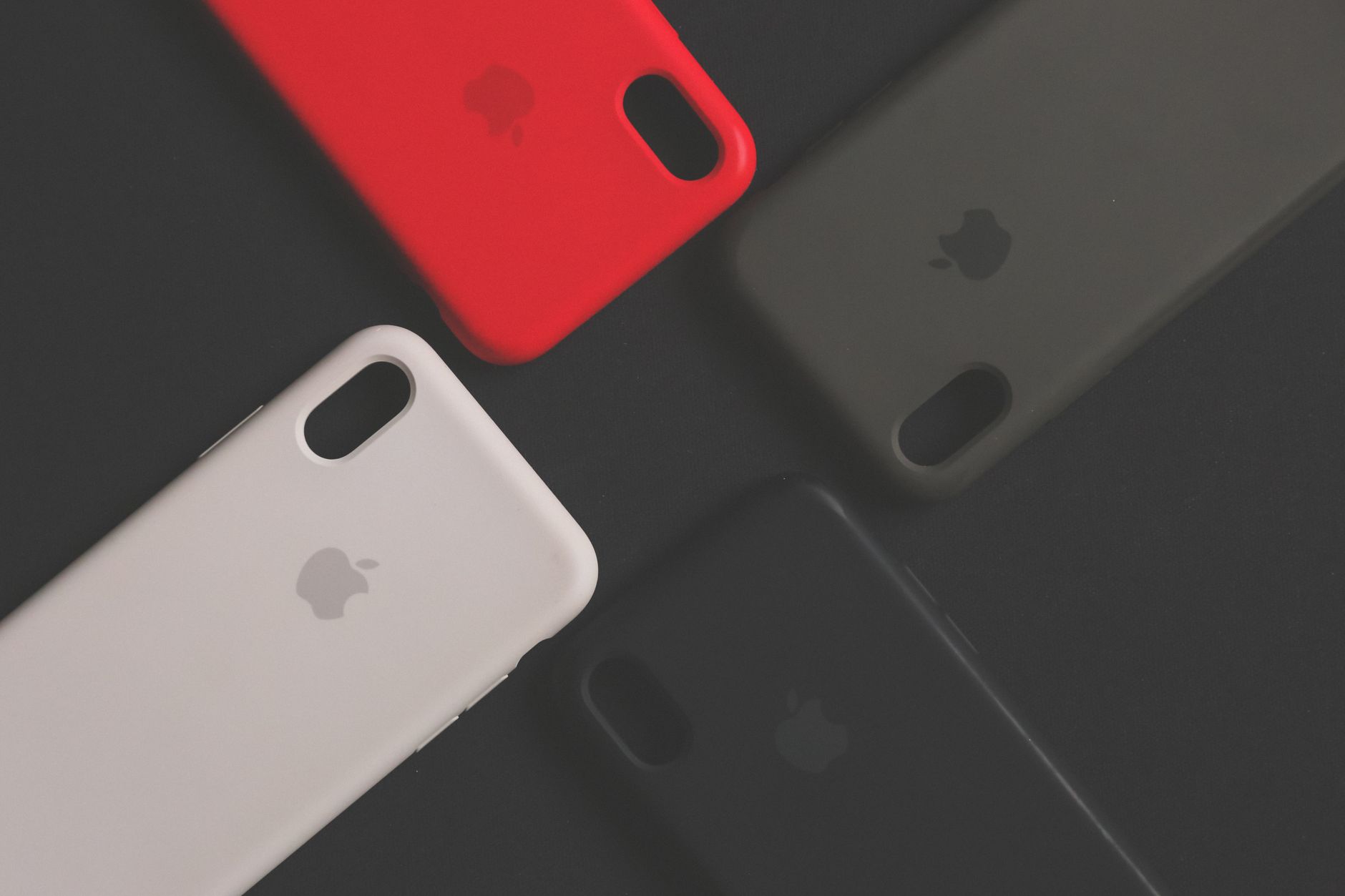 Several iPhone silicone cases in different colors
