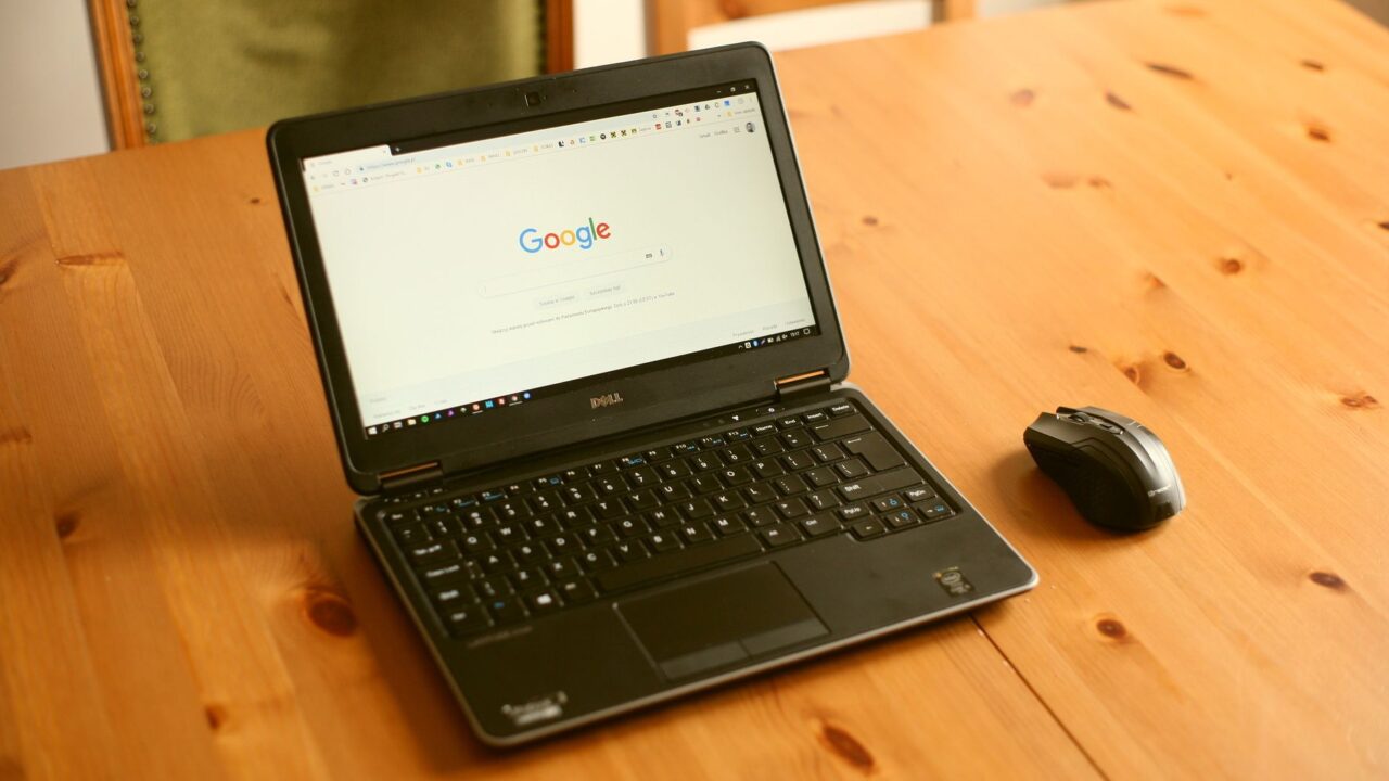 A laptop with a web browser open on a desk