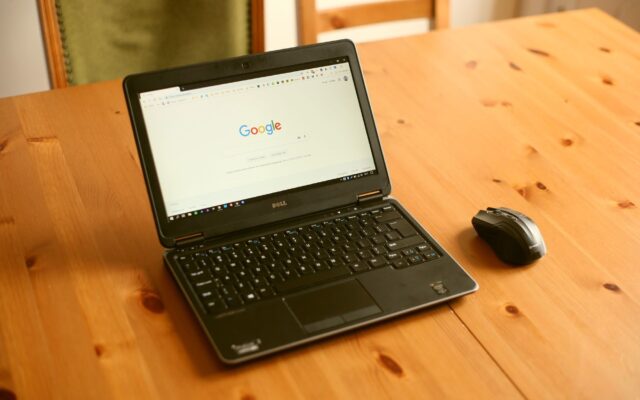 A laptop with a web browser open on a desk