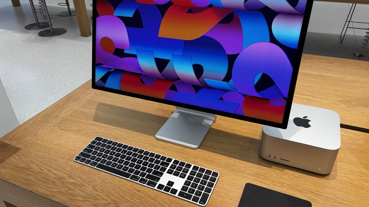 A Mac Studio next to a Studio Display on a desk