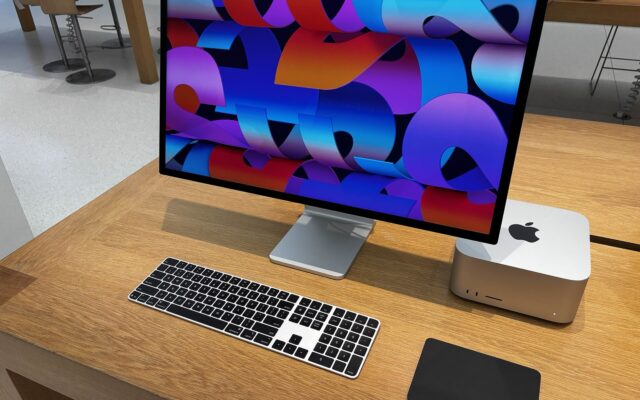 A Mac Studio next to a Studio Display on a desk