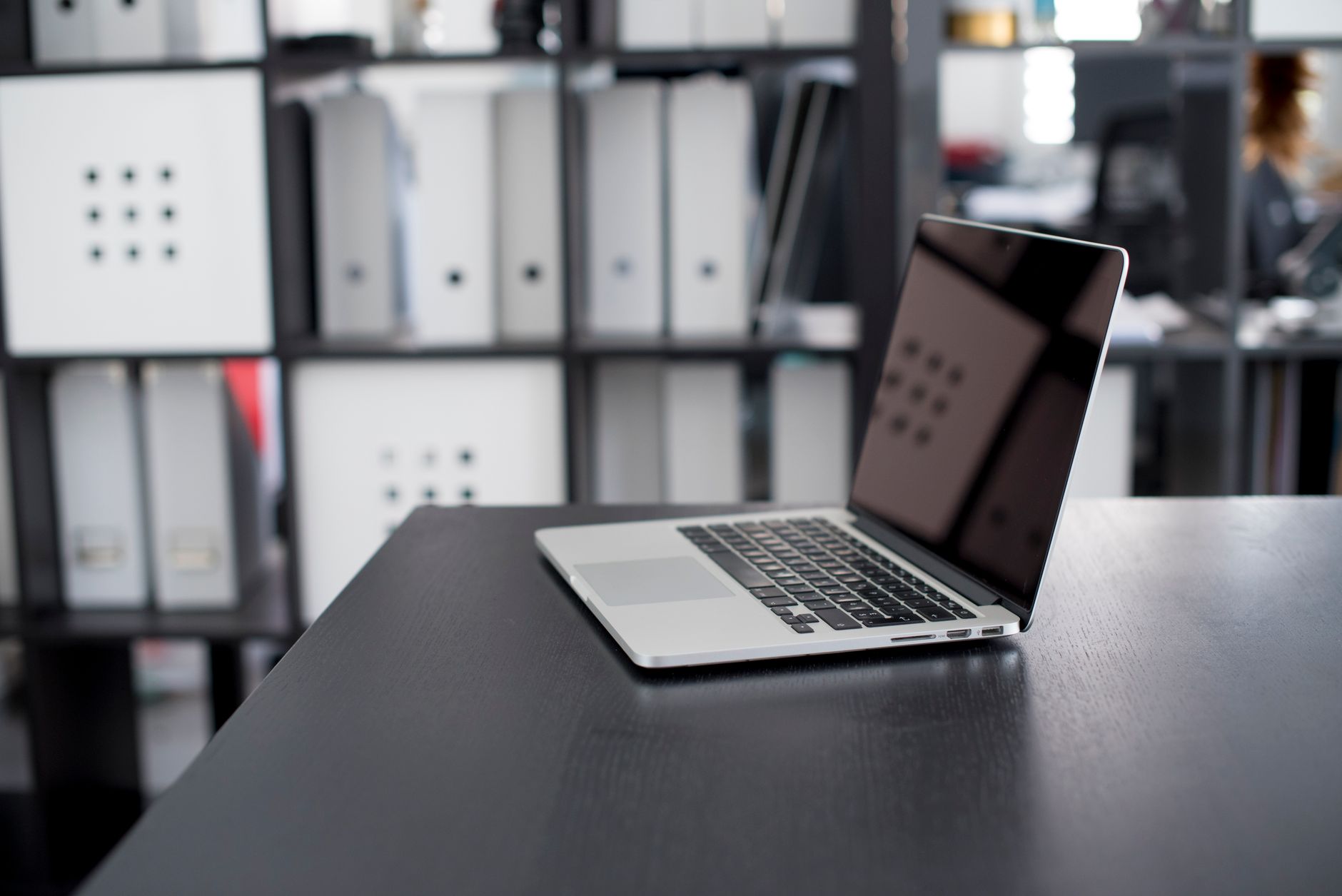 A MacBook Pro on an office desk