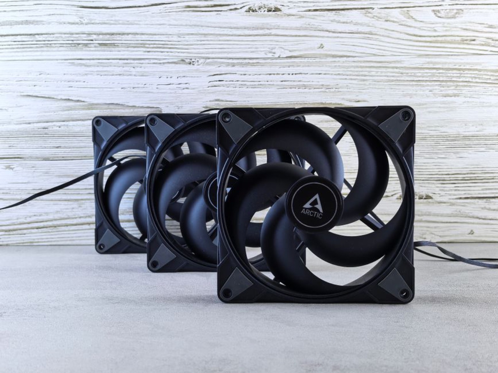 Three ARCTIC computer cooling fans