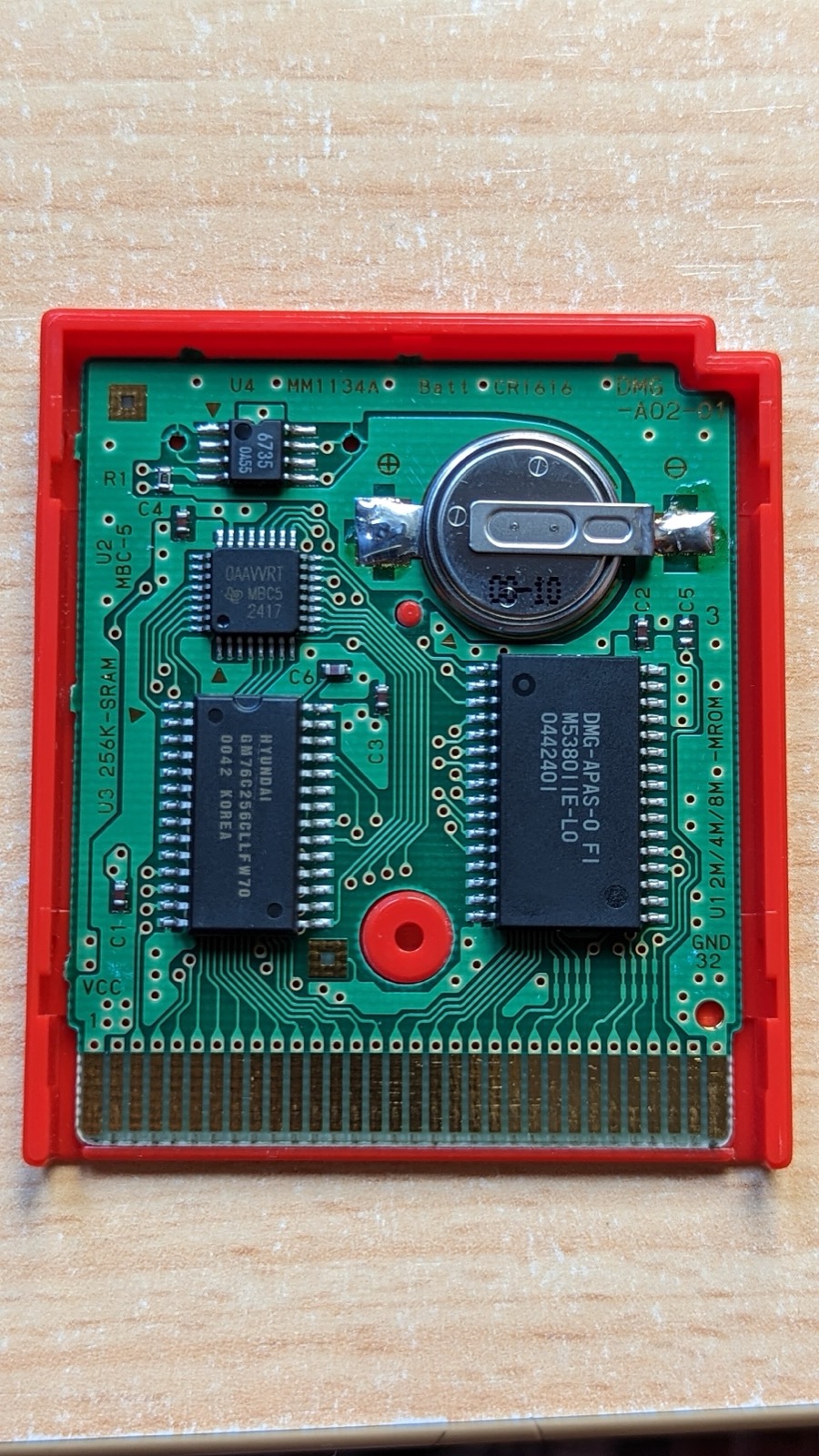 The circuit board inside a retail Pokémon Red cartridge