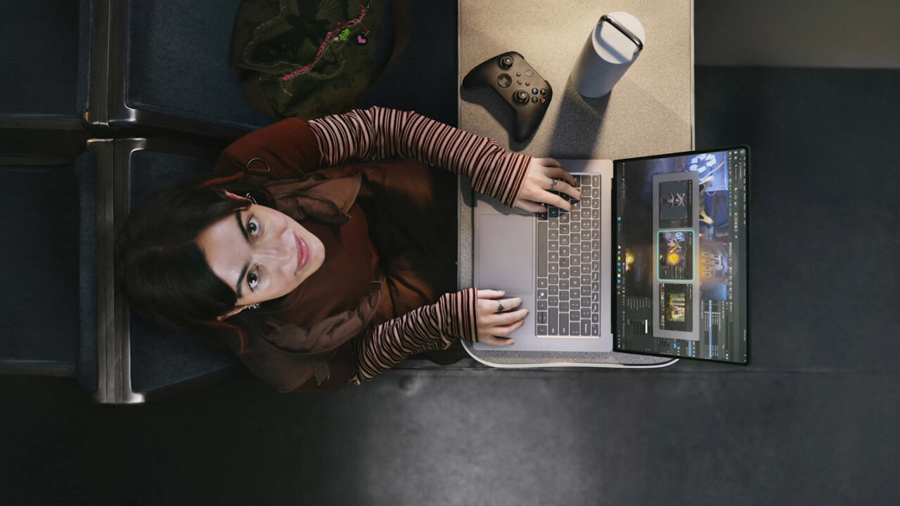 A person playing a game on an RTX Spark laptop