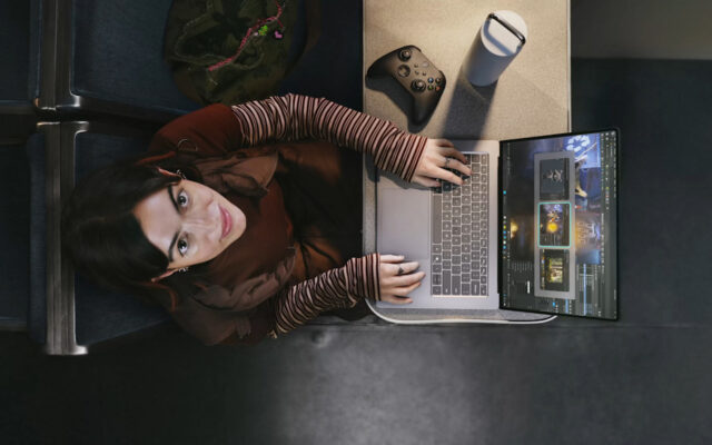 A person playing a game on an RTX Spark laptop